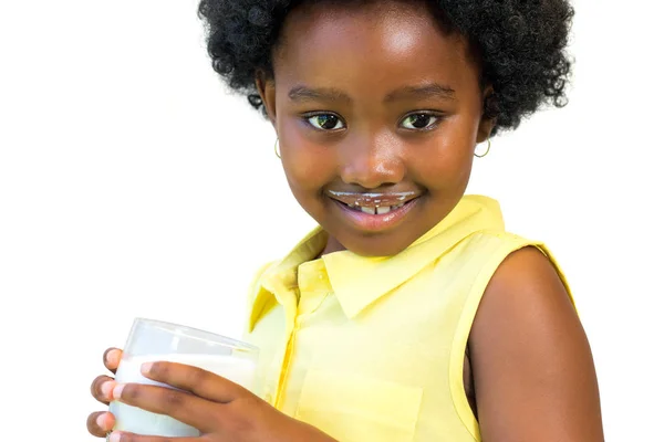 Cute little african girl with milk — Stock Photo, Image