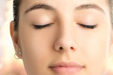 Relaxed meditating woman face  clipart