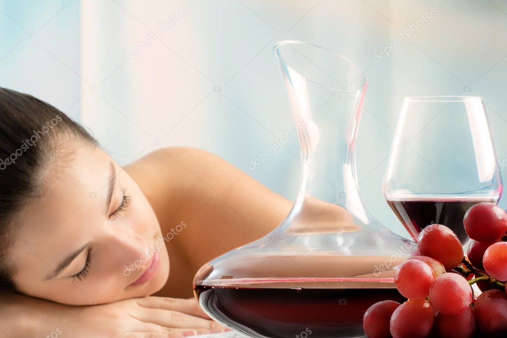 young girl laying in wine spa