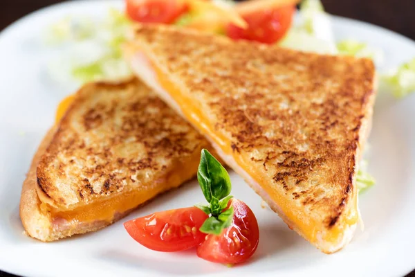 Toasted ham and cheese sandwich. — Stock Photo, Image