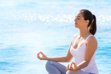 woman meditating in yoga position  clipart
