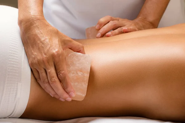 Himalayan salt stone massage. — Stock Photo, Image