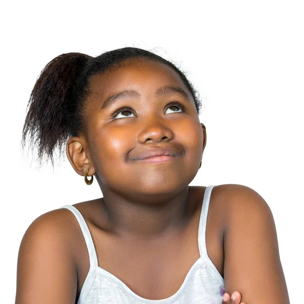 Süßes afrikanisches Mädchen schaut isoliert nach oben. — Stockfoto