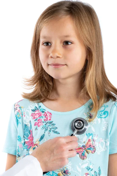 Cute girl having cardiovascular auscultation check up — 图库照片