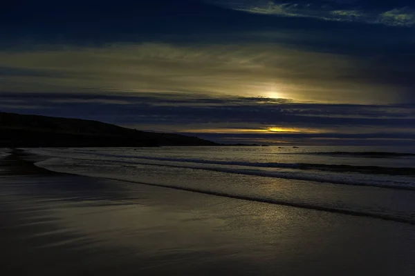 Západ slunce na Devon Jurské pobřeží — Stock fotografie
