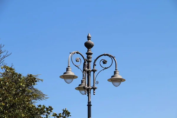 Beautiful lantern on cast bracket — Stock Photo, Image