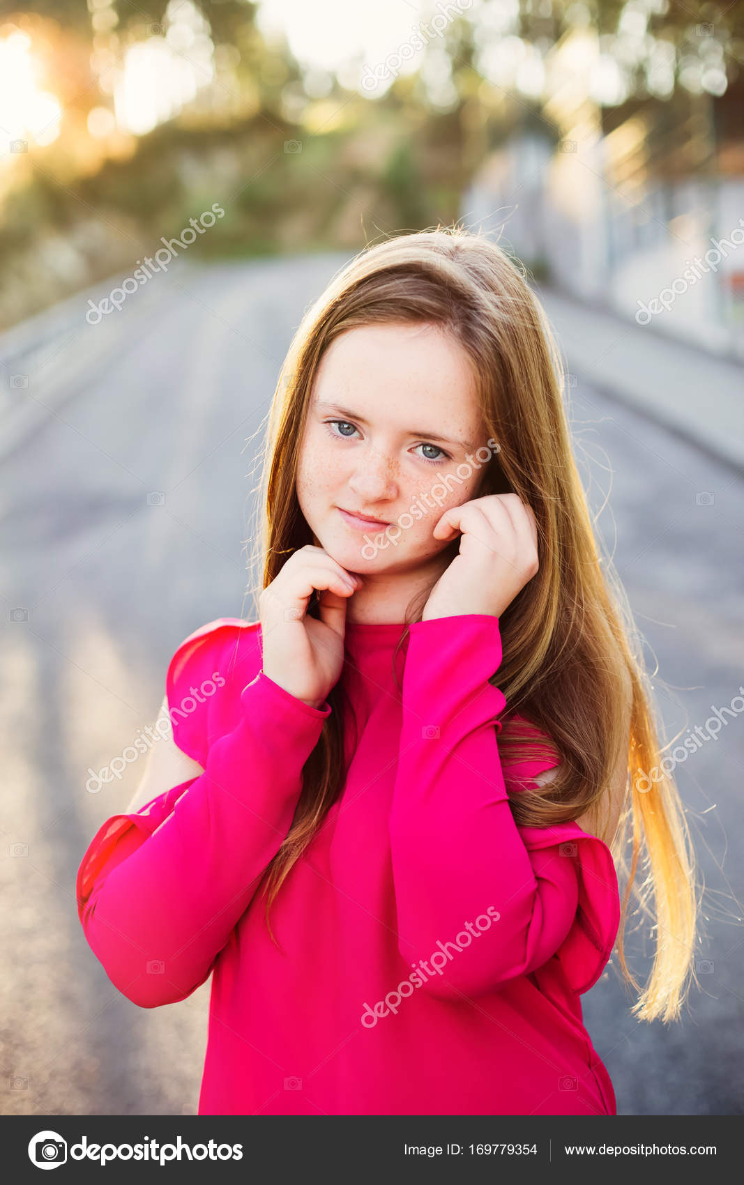 Pretty Girl With Freckles And Blue Eyes Wearing Rose Blouse Stan