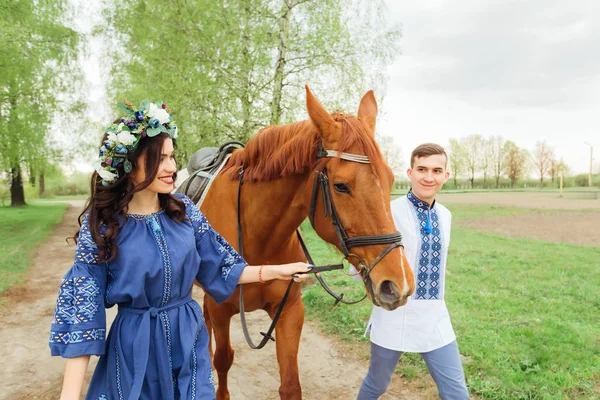 Happy Couple Walks Horse Park Holding Him Bridle — Stock Photo, Image