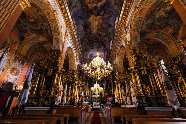 Lviv, Ukraine - 16 september 2017 - Interior of the church with paintings, arches and sculptures