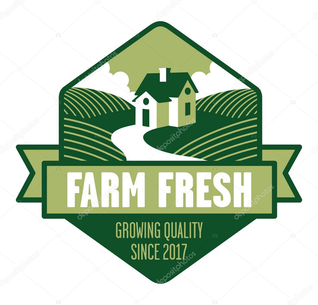 Farmhouse logo or badge with fields of crops and banner.