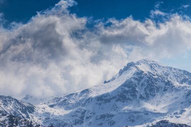 Beautiful winter scenery on a sunny day in the Transylvanian Alps