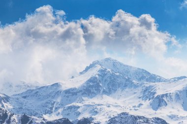 Beautiful winter scenery on a sunny day in the Transylvanian Alps