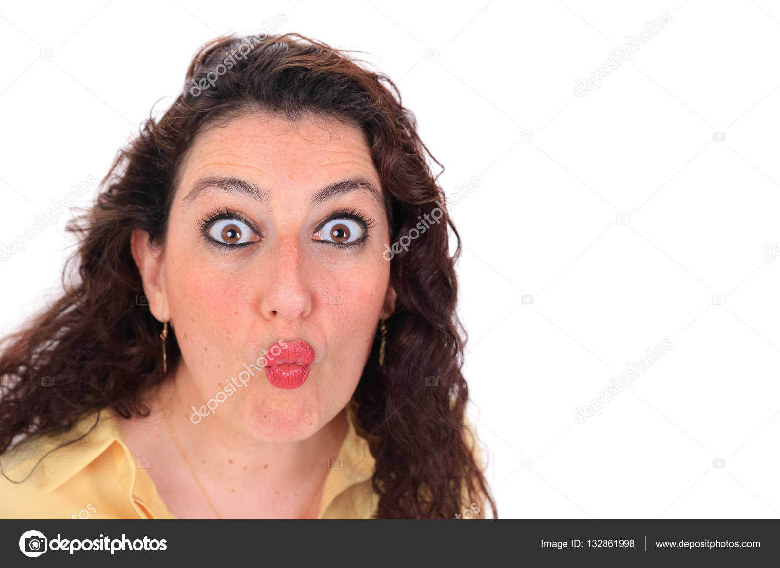 Headshot Of A Spanish Woman Throwing A Kiss Stock Photo