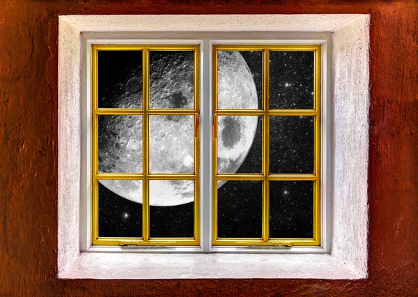 Luna grande y una noche estrellada vistas a través de una ventana Fotos De Stock