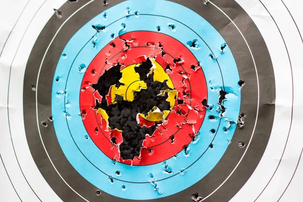 the target for practicing archery outdoors with holes