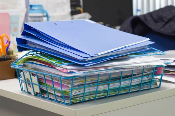 file folder and Stack of business report paper file on the table in a work office.