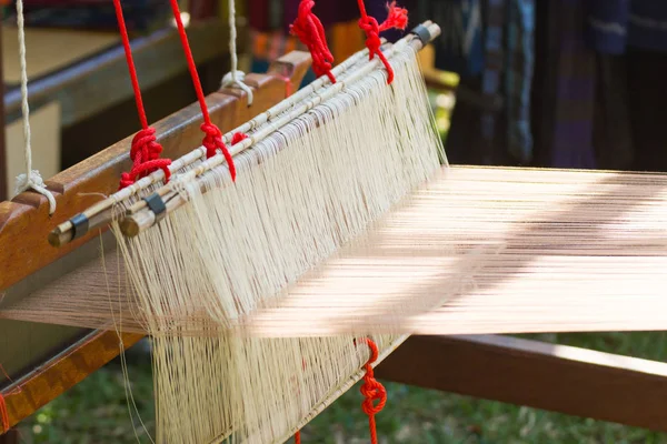 Household Loom weaving - Detail of weaving loom for homemade silk or textile production of Thailand