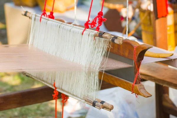 Household Loom weaving - Detail of weaving loom for homemade silk or textile production of Thailand