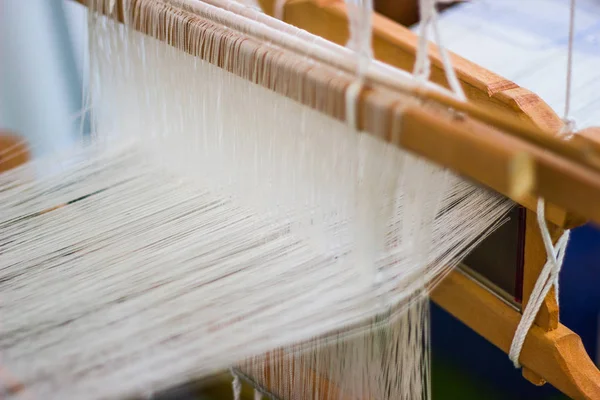 Household Loom weaving - Detail of weaving loom for homemade silk or textile production of Thailand