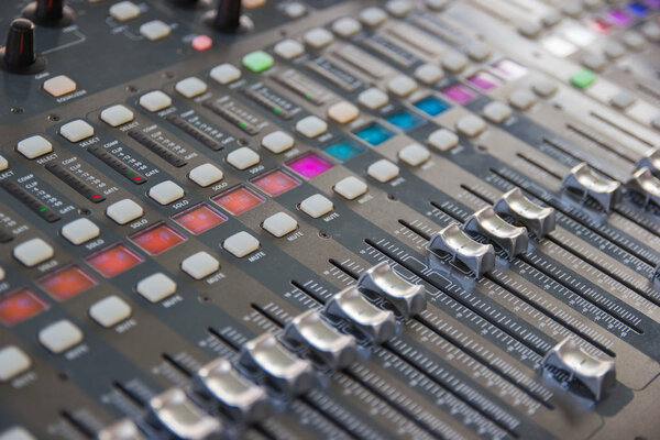 Close-up Mixing Console of a big HiFi system  The audio equipment, control panel of digital studio mixer.