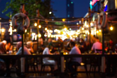 görüntü bir restoran gece festivalin bulanıklık ve mutlu ve bokeh arka plan, Bangkok Tayland için ile rahatlatıcı atmosfer.