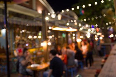 görüntü bir restoran gece festivalin bulanıklık ve mutlu ve bokeh arka plan, Bangkok Tayland için ile rahatlatıcı atmosfer.
