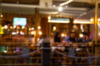 görüntü bir restoran gece festivalin bulanıklık ve mutlu ve bokeh arka plan, Bangkok Tayland için ile rahatlatıcı atmosfer.
