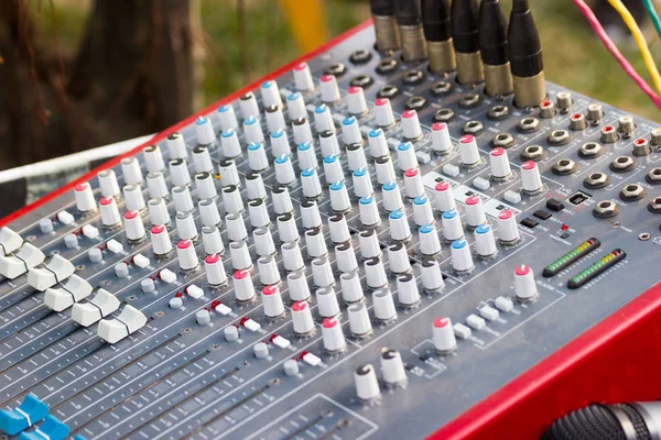 Closeup Mixing Console of a big HiFi system  The audio equipment, a control panel of digital studio mixer.