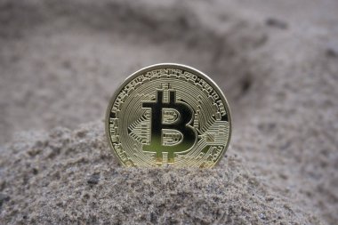 Kumdaki altın bitcoin