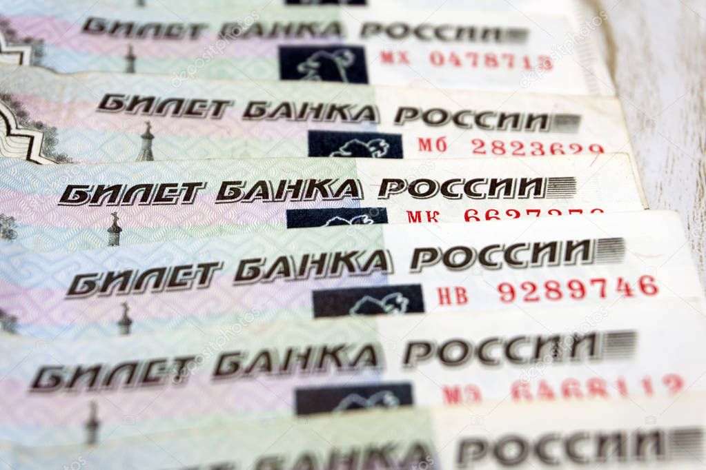 The tiles made of thousand-ruble bills, Russian money, macro mode .