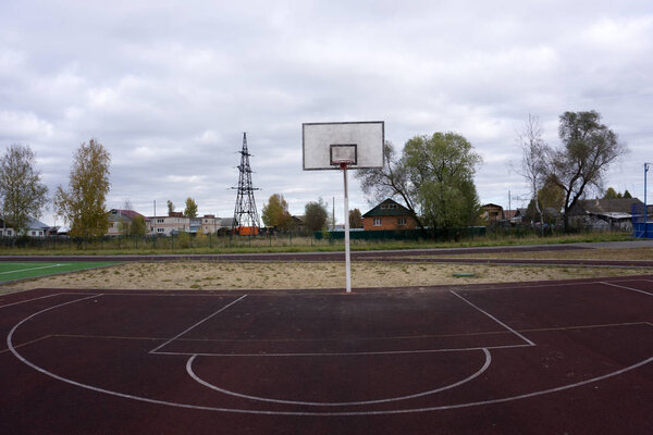 Basketball hoop cage, isolated large backboard closeup, new outdoor court set, green, red, orange, white back board blank copy space background