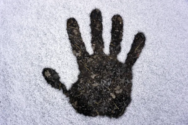 Hand Print in Snow shape sign snowflake surface