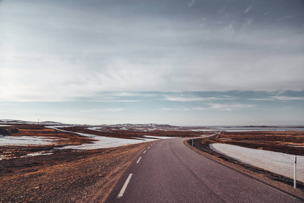 Norway, road near Vardo with still snow left even if it's summer