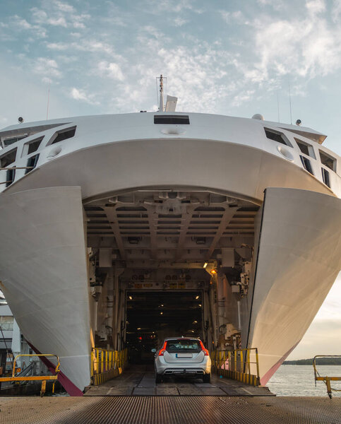 Driving inside a big car ferry in the port of Turku Finland in the evening
