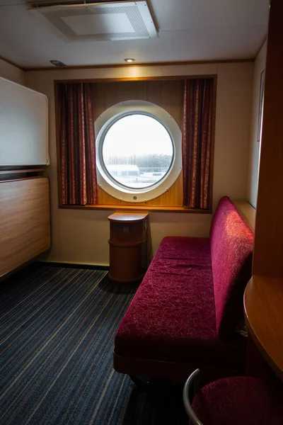 Inside a cabin of a large car ferry trafficin between Sweden and Finland