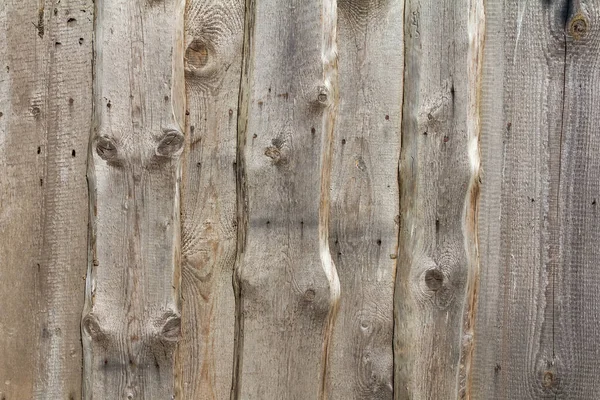 Düz işlenmiş eski bir ahşap çitin dokusu.
