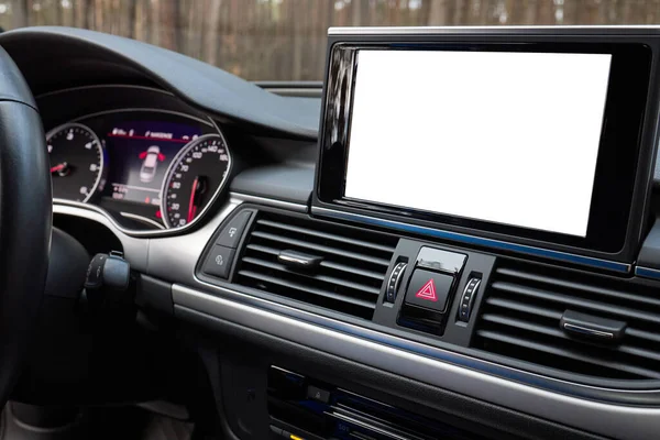 Monitor in car with isolated blank screen use for navigation maps and GPS rearview camera and parking assistant. Isolated on white with clipping path Car display with blank screen mock up copy space.