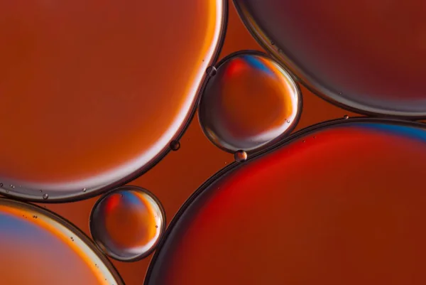 Geometriska former, droppar av olja i vatten. Futuristiska abstrakt bakgrund. — Stockfoto