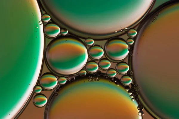 Geometric shapes, drops of oil in water. Futuristic abstract background.