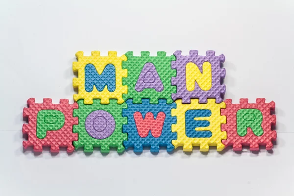Puzzle parçaları kelime insan gücü ile — Stok fotoğraf