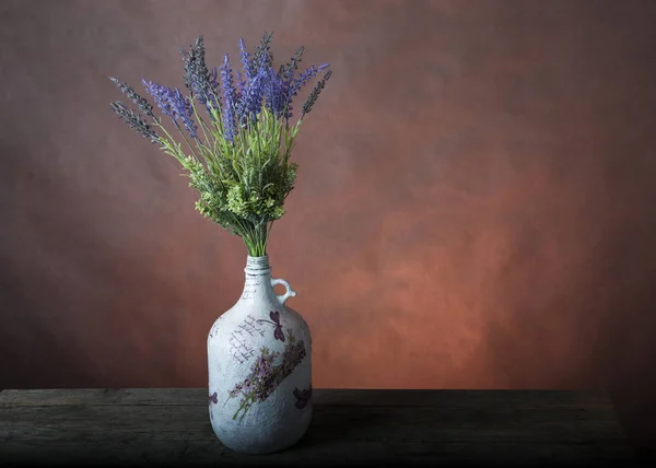 Bouquet in the hand painted vase