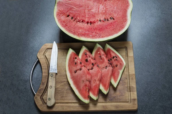 Half watermelon on the wooden board — Stock Photo, Image