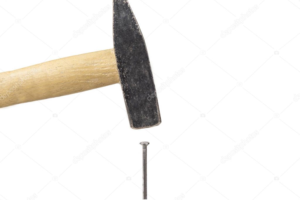 Hammer and nails on the white background