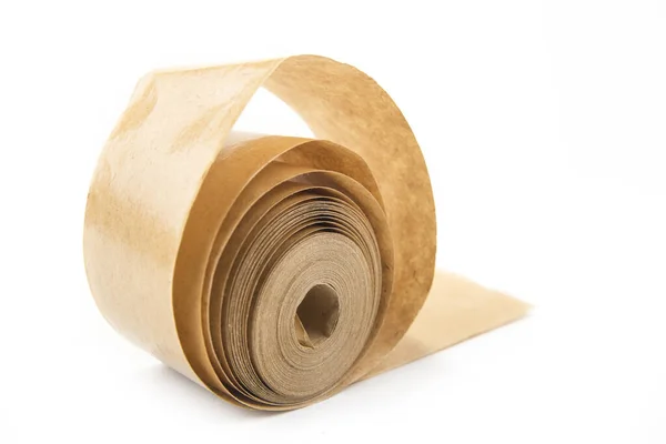 白のオフィスのための古い紙テープの茶色のロール — ストック写真