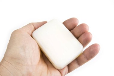 Erkek elinde sabun, beyaz elinde.