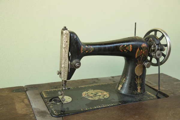 Old metal manual retro sewing machine