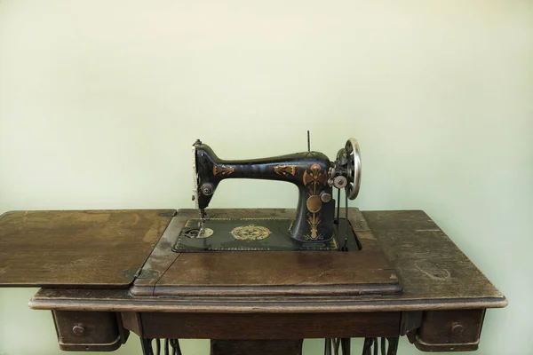 Old metal manual retro sewing machine