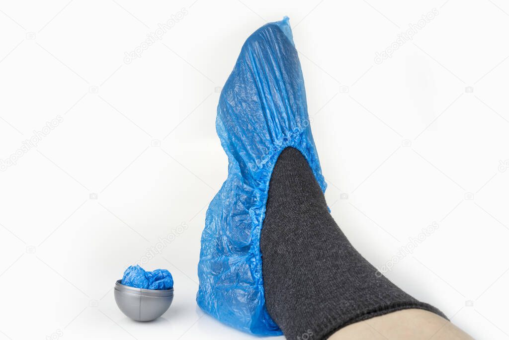 Disposable shoes protection on a white background
