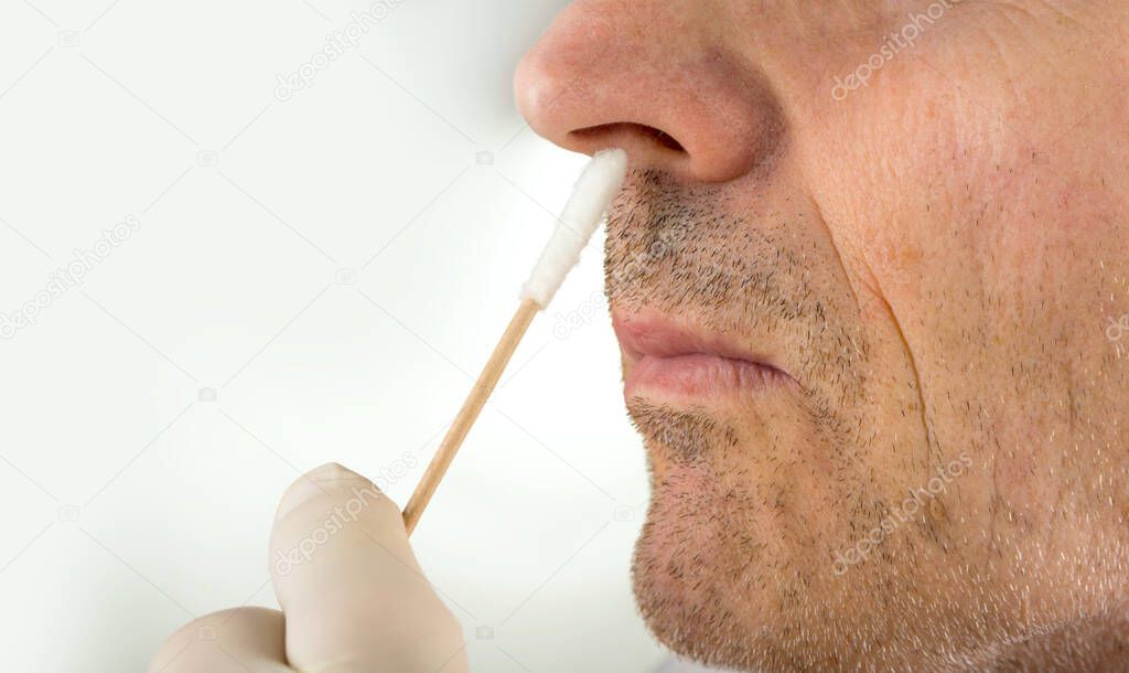 Taking a  virus test sample from a nose