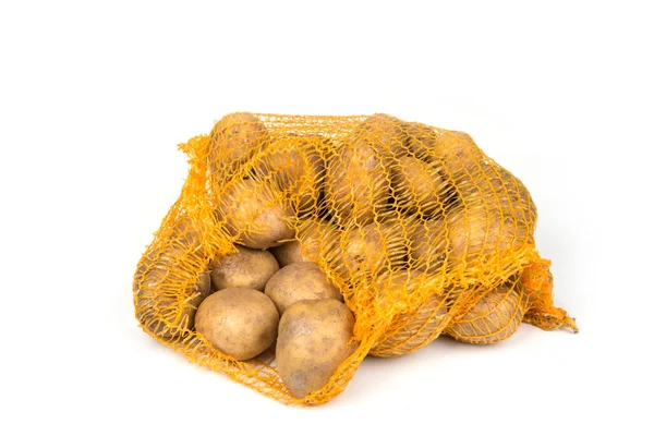 白い袋の中のジャガイモ — ストック写真